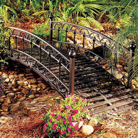 Enhance your landscape with our gracefully arched Chestwick Metal Garden Bridge. Use this metal ...