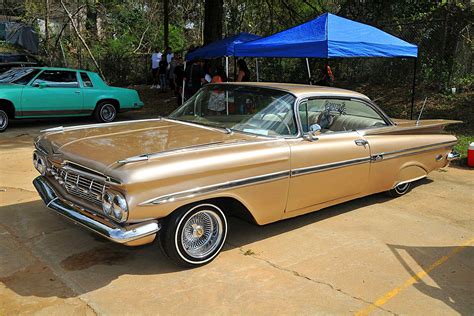 Royal Legacy Lowrider Show sand colored 1959 Chevy Impala - Lowrider