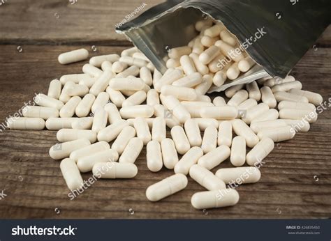 Scattered Pills, (Bcaa) Amino Acids Stock Photo 426835450 : Shutterstock