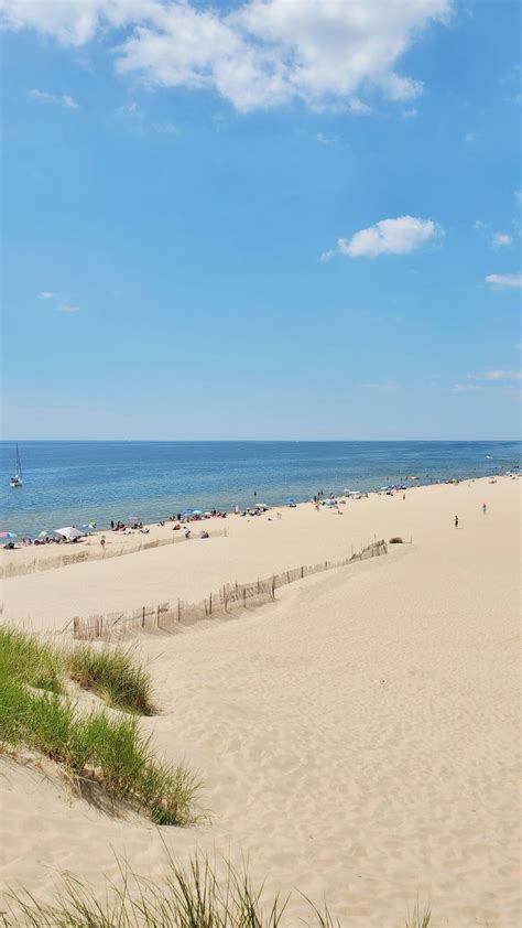 Muskegon State Park beach on Lake Michigan: Channel Beach near sand dunes and lighthouses ⚓ ...