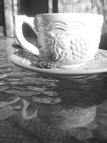 Coffee cup and its reflection in a glass table | black and w… | Vicky van Santen | Flickr