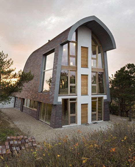 This Dutch house features exposed tree-trunk columns inside | Dunes ...