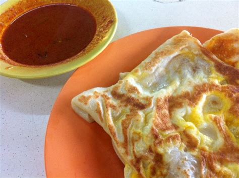 Singapore breakfast - Roti prata with egg : r/food