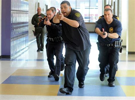 Cops, with kids, train for school crises