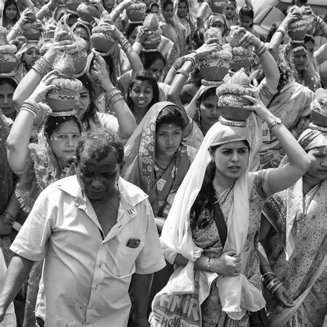 Grayscale Photo of People in Traditional Clothing · Free Stock Photo