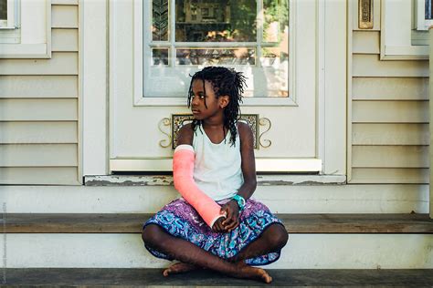 "Black Girl With Pink Cast On Her Broken Arm" by Stocksy Contributor ...