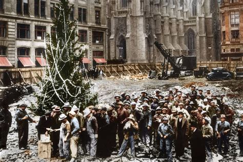 Construction workers in 1931 line up to receive their paycheck in front ...