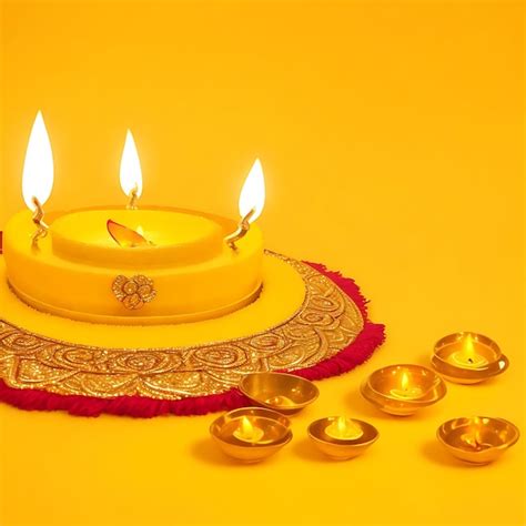 Premium AI Image | happy diwali yellow background with decorative diya