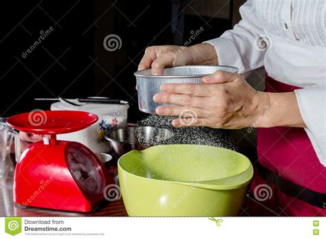 Sifting flour stock image. Image of cooking, mixing, worktop - 70420477