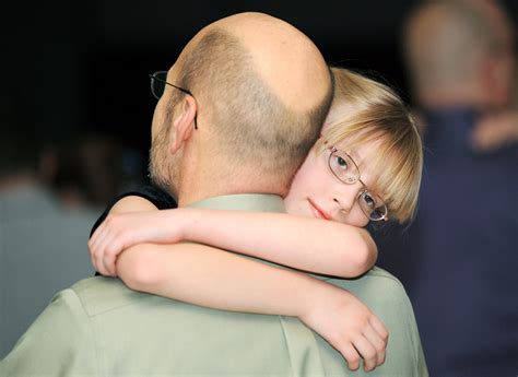 Giving dad a hug - Photo of the Day - cleveland.com