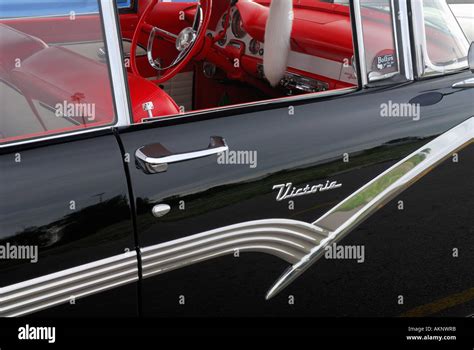 Black 1956 Ford Fairlane Victoria viewing restored red interior Stock Photo: 8597562 - Alamy