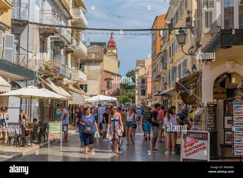 kerkyra on the greek island of corfu in a busy crowded tourist area Stock Photo - Alamy