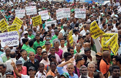 Sri Lankan lawmakers fight in Parliament over PM dispute