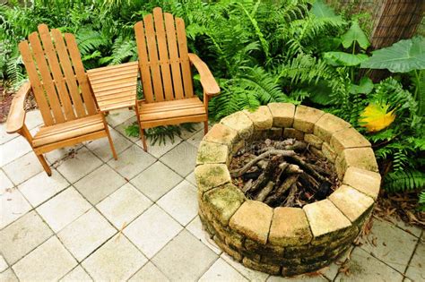 Adirondack Chairs and Fire Pit Stock Photo - Image of relaxation, foliage: 25104382