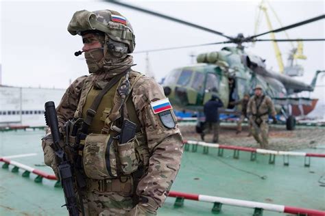 Russian Spetsnaz operator standing on guard near helicopter landing zone. Photo by Vadim Veedoff ...