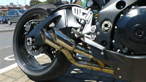 Motorcycle Rear Wheel And Exhaust Free Stock Photo - Public Domain Pictures