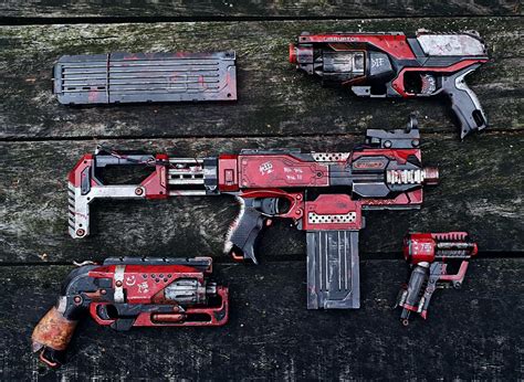 Just finished painting my stryfe, tell me what you think and witch gun ...