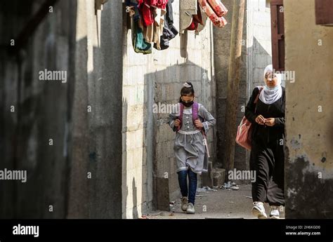 Palestinians on the street of Rafah refugee camp in the southern Gaza ...