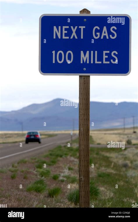 Next gas 100 miles road sign at the Oregon/Nevada border in McDermitt ...