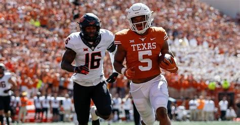 LOOK: Texas running back Bijan Robinson inks NIL deal with Lamborghini ...