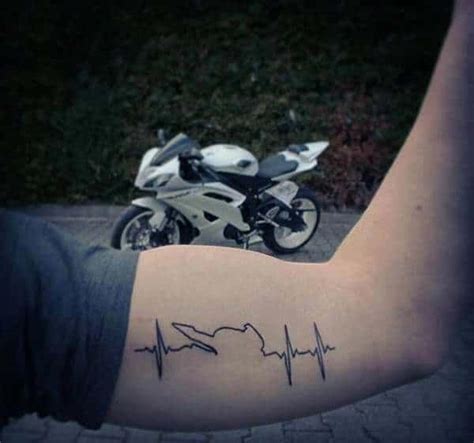 Popularly known as the EKG line tattoo, the pulse symbol is similar to a little monitor with an ...