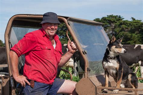 "Farmer With Working Dog" by Stocksy Contributor "Rowena Naylor" - Stocksy