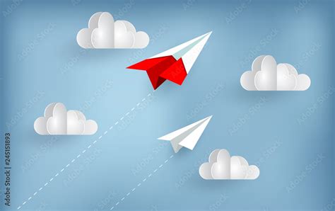 paper plane fly up to sky while flying above a cloud. creative idea ...