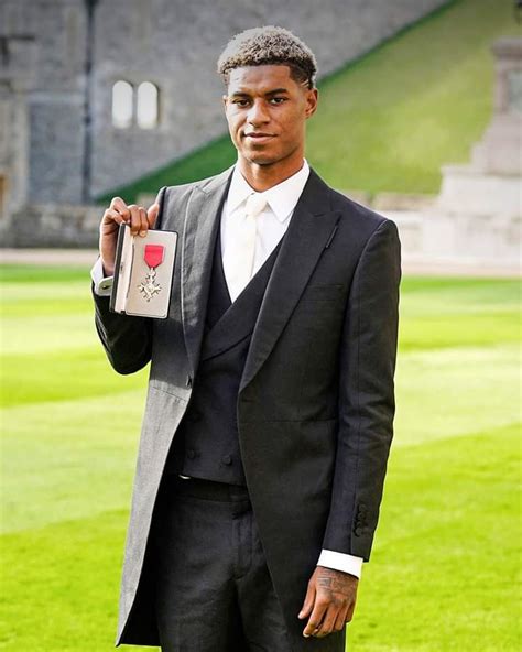 Marcus Rashford is awarded the MBE by Prince William