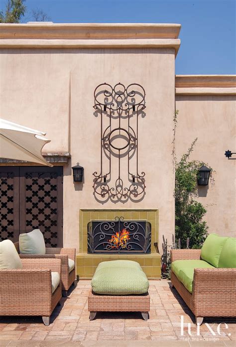 Mediterranean Outdoor Seating Area - Luxe Interiors + Design