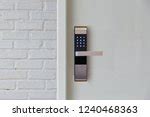 Free Image of White Brick Wall and Locked Door | Freebie.Photography