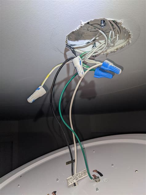 Trying to install a simple ceiling light. Connected the wires as shown in the picture but the ...