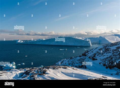 A view of Ilulissat Icefjord, an UNESCO World Heritage Site. Ilulissat ...