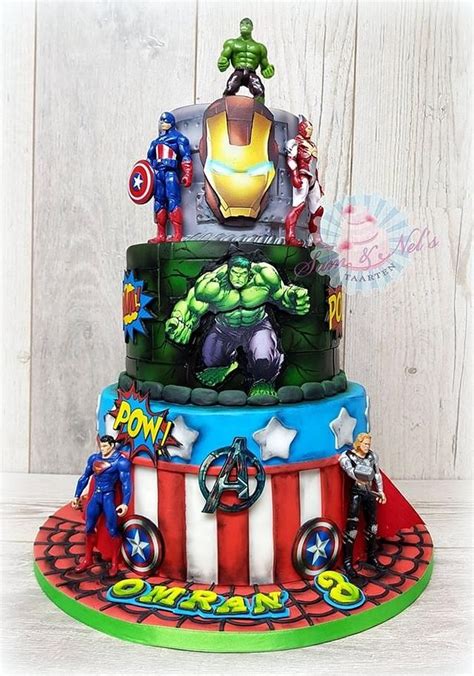 We made this cool superhero cake for Omran. He turned 3. He was very ...