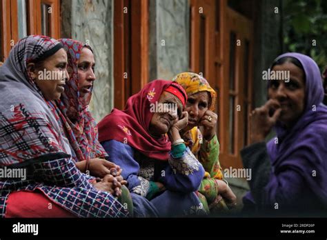 July 22, 2023, Srinagar Kashmir, India : women gather at a damaged road ...