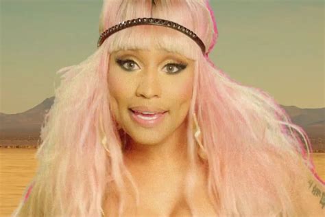 Nicki Minaj & David Guetta Channel 'Mad Max' in 'Hey Mama' Video