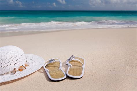Hat And Flip-flops On The Beach Free Stock Photo - Public Domain Pictures