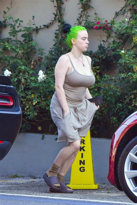 billie eilish stands out in her neon green hair as she steps out in los angeles-111020_3
