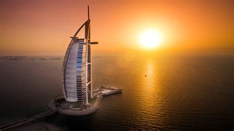 Download Sea Sunset Building United Arab Emirates Dubai Man Made Burj Al Arab 4k Ultra HD Wallpaper