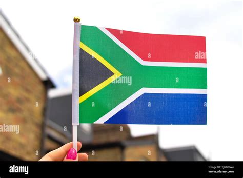 close up of national flag of south africa,red green and blue colors ...