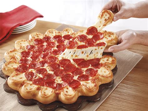 Pizza Hut rolls out pie with "cheese pockets" - CBS News