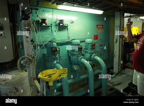 Cruise ship engine room interior with water tight doors electrical and diesel engines, water ...