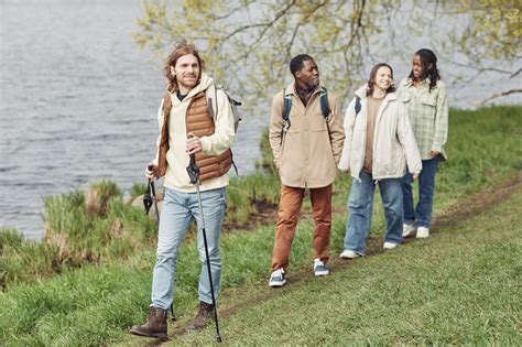 Premium Photo | Friends walking together in the park