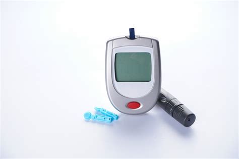 Premium Photo | Digital glucometer and lancet pen with stethoscope isolated