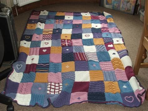 knitted patchwork blanket- wish I knew how to make one of these in 2024 | Patchwork blanket ...