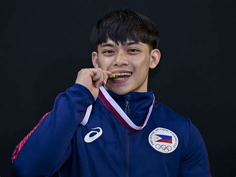 Filipino gymnast Carlos Yulo strikes gold in World Cup Series at ...