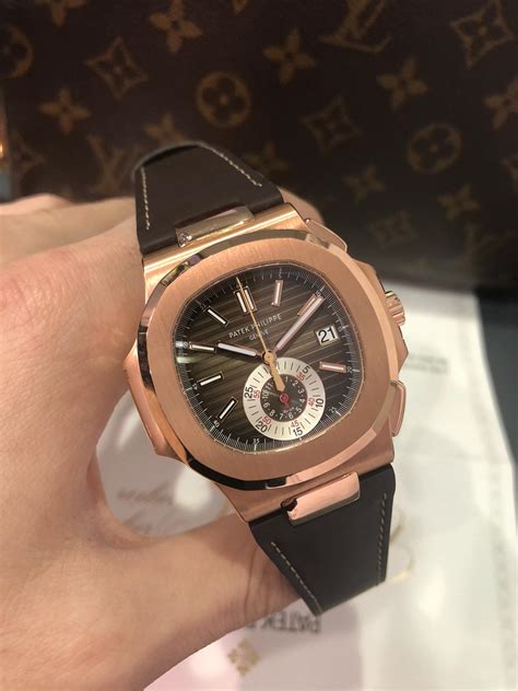 PATEK PHILIPPE 18CT ROSE GOLD NAUTILUS CHRONOGRAPH 5980 - Carr Watches