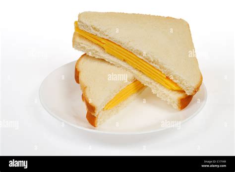 Cheese sandwich with 2 slices of cheese on white bread cut in half on Stock Photo, Royalty Free ...