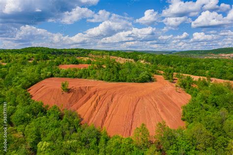 Gant, Hungary - Aerial view of abandoned bauxite mine, bauxite formation, the red mountains ...