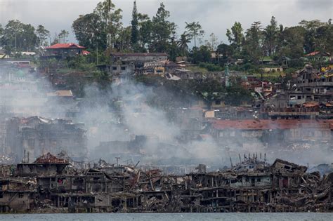 150 war dead share Marawi mass grave: official | ABS-CBN News