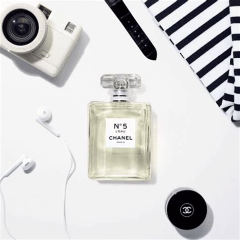 Minimalist Chanel No 5 Perfume GIF | GIFDB.com